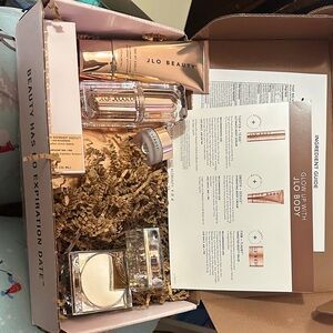 JLO Beauty Skincare Serum & Face Oil Set with Gold and Cream Packaging